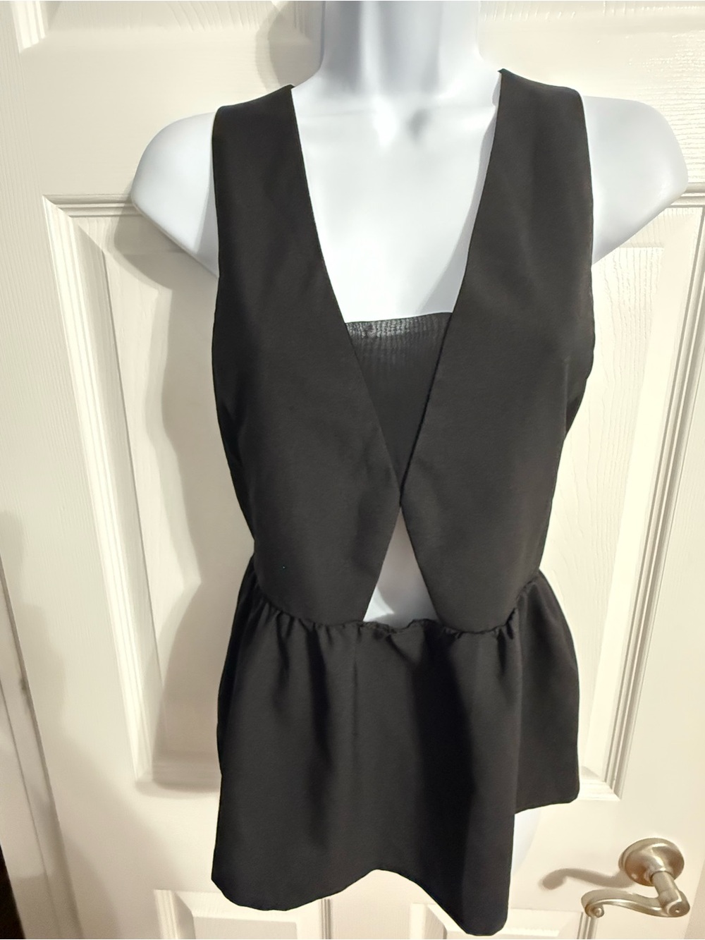 Tobi Black Sleeveless V-Neck Peplum Top